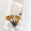 Gold measuring spoons
